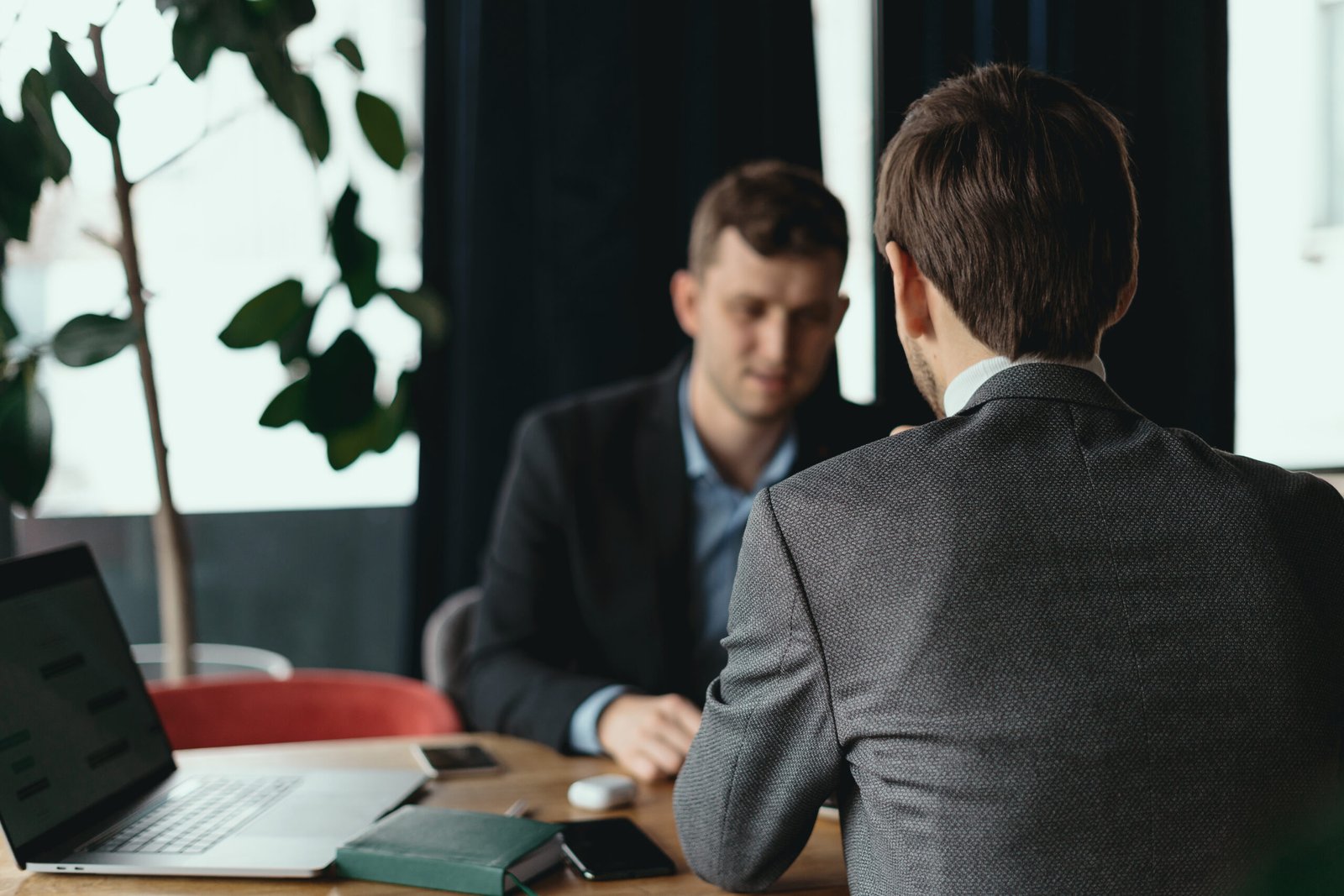 HR consultant meeting a manager in an office