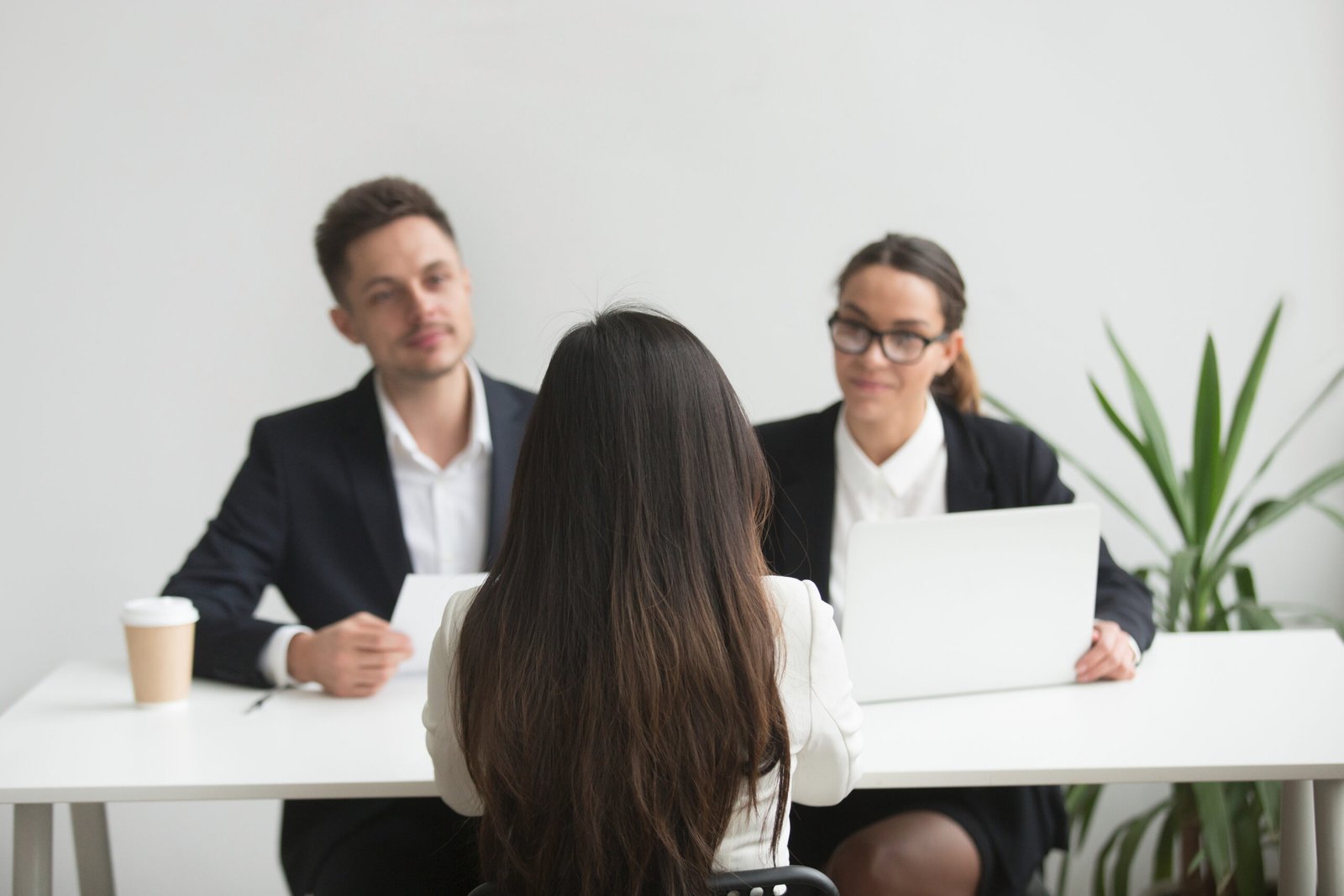Candidate in a mock interview with two interviewers